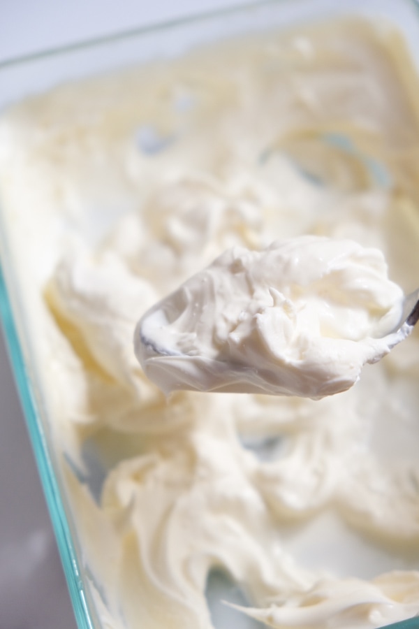 clotted cream on a spoon